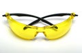 Protective yellow glasses on a white background Royalty Free Stock Photo