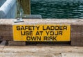 Safety Ladder Use at Own Risk Royalty Free Stock Photo