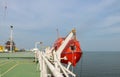 Safety lifeboat on deck, Orange Lifeboat Hanging oat Royalty Free Stock Photo