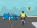 Dangerous left turn in front of a motorcycle. Road accident involving a car and a motorcycle.