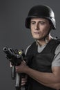 Safety, paintball sport player wearing protective helmet aiming Royalty Free Stock Photo