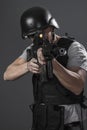 Safety, paintball sport player wearing protective helmet aiming Royalty Free Stock Photo