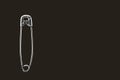 Safety pin on a dark brown background Royalty Free Stock Photo