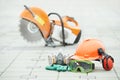 Safety protective equipment and disc cutter Royalty Free Stock Photo