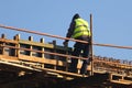 Safety risc worker without helmet at the construction site