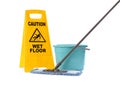 Safety sign with phrase Caution wet floor, mop and bucket on white background. Cleaning service Royalty Free Stock Photo