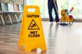 Safety sign with phrase Caution wet floor Royalty Free Stock Photo