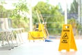 Safety sign with phrase Caution wet floor Royalty Free Stock Photo