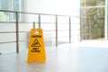 Safety sign with phrase Caution wet floor Royalty Free Stock Photo