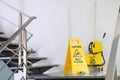 Safety sign with phrase Caution wet floor Royalty Free Stock Photo