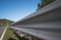 Safety steel barrier on freeway bridge designed to prevent the exit of the vehicle from the curb or bridge. Royalty Free Stock Photo