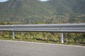 Safety steel barrier on freeway bridge designed to prevent the exit of the vehicle from the curb or bridge. Royalty Free Stock Photo