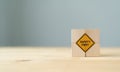 Safety symbols and first signs, work safety, caution work hazards, danger surveillance, zero accident concept on wooden cubes with Royalty Free Stock Photo