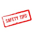 Safety tips red rubber stamp isolated on white.