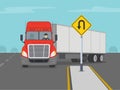 Safety truck driving. Red semi-truck turning left on highway. Yellow u-turn road sign allows to make a u-turn.