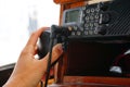 Safety of the use of VHF radio in pleasure boating and leisure sailing. Possibility of Mayday shipment and ask for help. Royalty Free Stock Photo