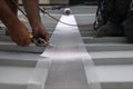 Safety workplace handy repairing man repairing roof wire mesh grid using cutter