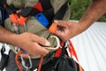 Safety workplaces industrial clipping Carabiner into side safety harness loop prior work Royalty Free Stock Photo