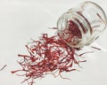 Saffron from Crocus sativus flower closed in glass cup. Royalty Free Stock Photo