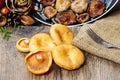 Saffron milk cap mushrooms on wooden table Royalty Free Stock Photo