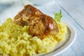 Saffron Risotto with Crispy Pork Royalty Free Stock Photo