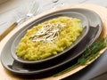 Saffron risotto with gold leaf Royalty Free Stock Photo