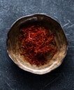 Saffron Spice. Saffron spices in a bowl. Indian spice top view.