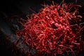 Saffron threads on dark background Royalty Free Stock Photo