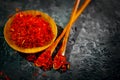 Saffron. Various Indian Spices on black stone table. Spice and herbs on slate background. Cooking Royalty Free Stock Photo