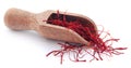 Saffron in a wooden scoop Royalty Free Stock Photo