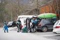 Kayakers are getting their equipment out of cars in Rhine Gorge Ruinaulta in Switzerland.