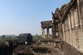 Saftey reconstruction and repair of beautiful ancient angkor wat temple ruins tower, with forest in background