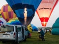 Hot air balloon crews getting ready for take off during Saga International Balloon Fiesta in Japan Royalty Free Stock Photo