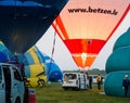 Hot air balloon crews getting ready for take off during Saga International Balloon Fiesta in Japan Royalty Free Stock Photo