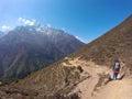 Sagarmatha National Park, Nepal - May 2019: Trekker woman coming back from Everest Base Camp to Lukla, in Nepal