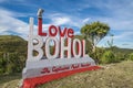 Sagbayan, Bohol, Philippines - An I love Bohol signage at Captain\'s Peak Garden, with views of the Chocolate Hills