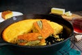 Sage Cornbread Cut Into Pieces in a Cast-Iron Skillet Royalty Free Stock Photo