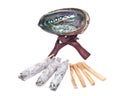 Sage smudge stick, rainbow abalone shell and palo santo smudging sticks Royalty Free Stock Photo
