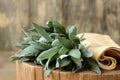 Sage tuft from plant herb leaves on rustic wood