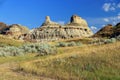 Dinosaur Provincial Park, Large Erosion Feature in Evening Light in Desert Landscape, Alberta, Canada Royalty Free Stock Photo