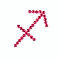 Sagittarius. Sign of the zodiac of red rhinestones on a white ba