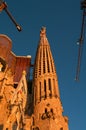 Sagrada Familiar Catholic Cathedral at bloody sunset during construction in Barcelona, Spain, cityscape, closeup