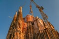 Sagrada Familiar Catholic Cathedral at bloody sunset during construction in Barcelona, Spain, cityscape, closeup