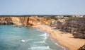 Surfers on portuguese beach near Sagres village