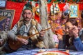 Kazakh family of hunters with golden eagles inside the mongolian Yurt. In Bayan-Olgii Province is populated mainly by Kazakhs