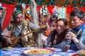 Kazakh family of hunters with golden eagles inside the mongolian Yurt. In Bayan-Olgii Province is populated mainly by Kazakhs