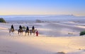 Sahara desert camel trekking tour with berber adventure dromadaires horse riding and berber guiding excursion Royalty Free Stock Photo