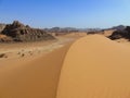 Sahara desert dunes and hills Royalty Free Stock Photo