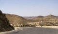 Sahara desert - rocks and route Royalty Free Stock Photo