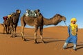 SAHARA DESERT, MOROCCO, APRIL 13, 2016. Tuareg man portrait with Royalty Free Stock Photo